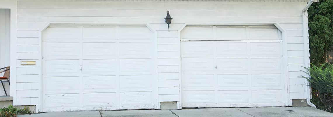 Roller Garage Door Dropped Down Replacement in Romeoville, IL