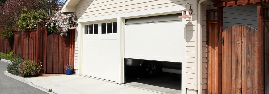 Fix Metal Garage Door Jerking in Romeoville, Illinois